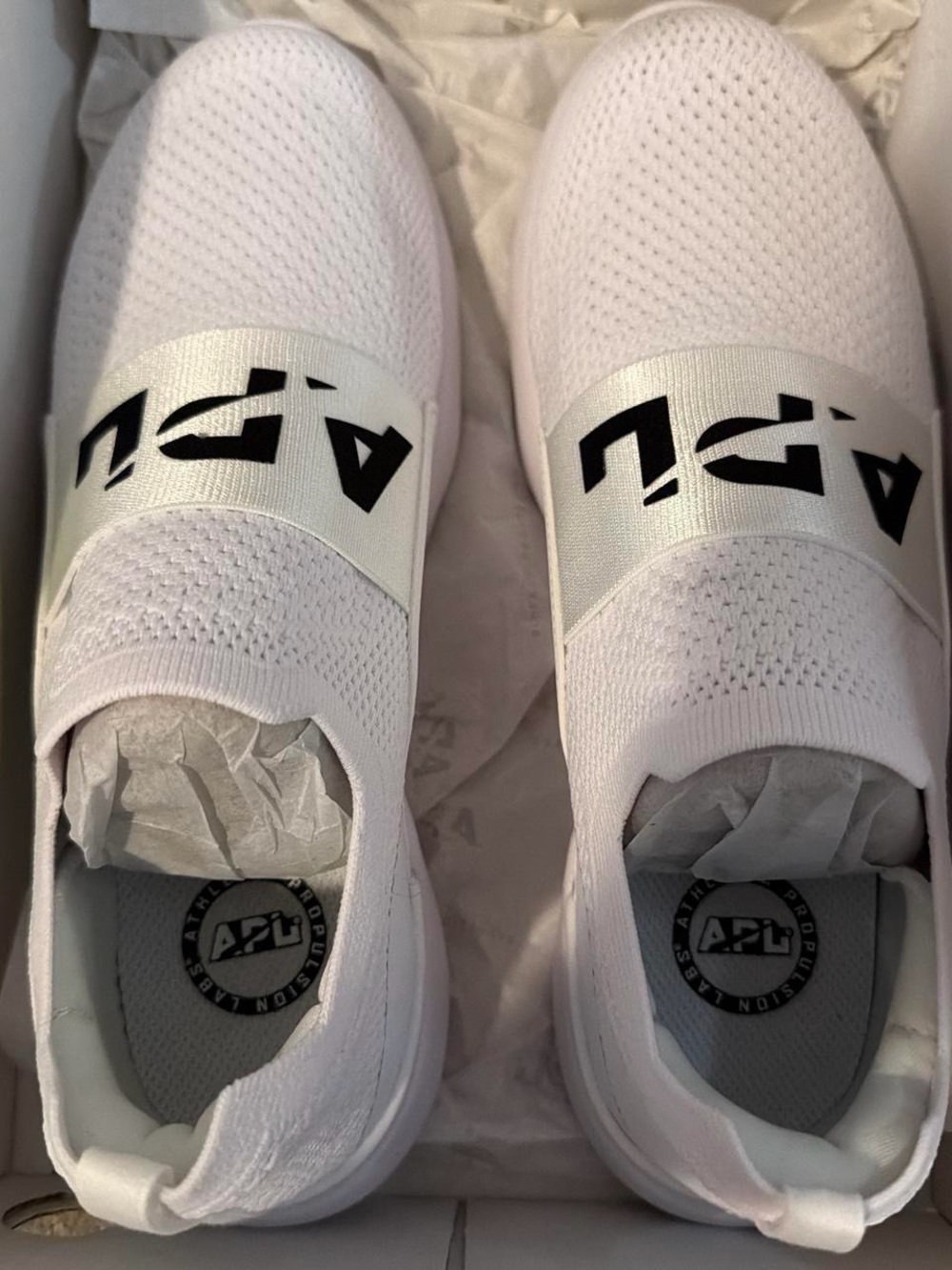 APL White Slip-On Athletic Shoes with Black Logo